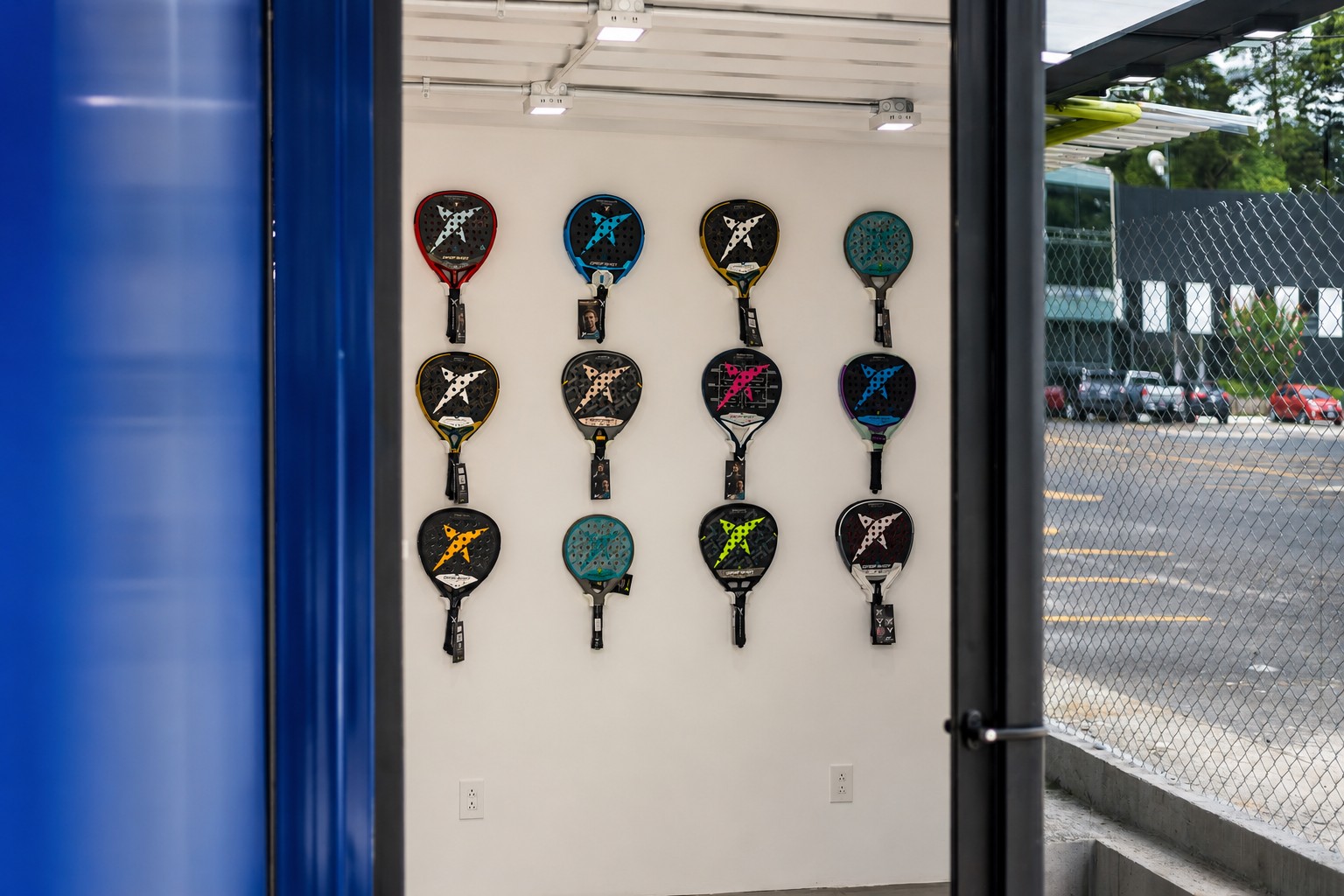 Padel Sport Center — exhibidor de raquetas Drop Shot